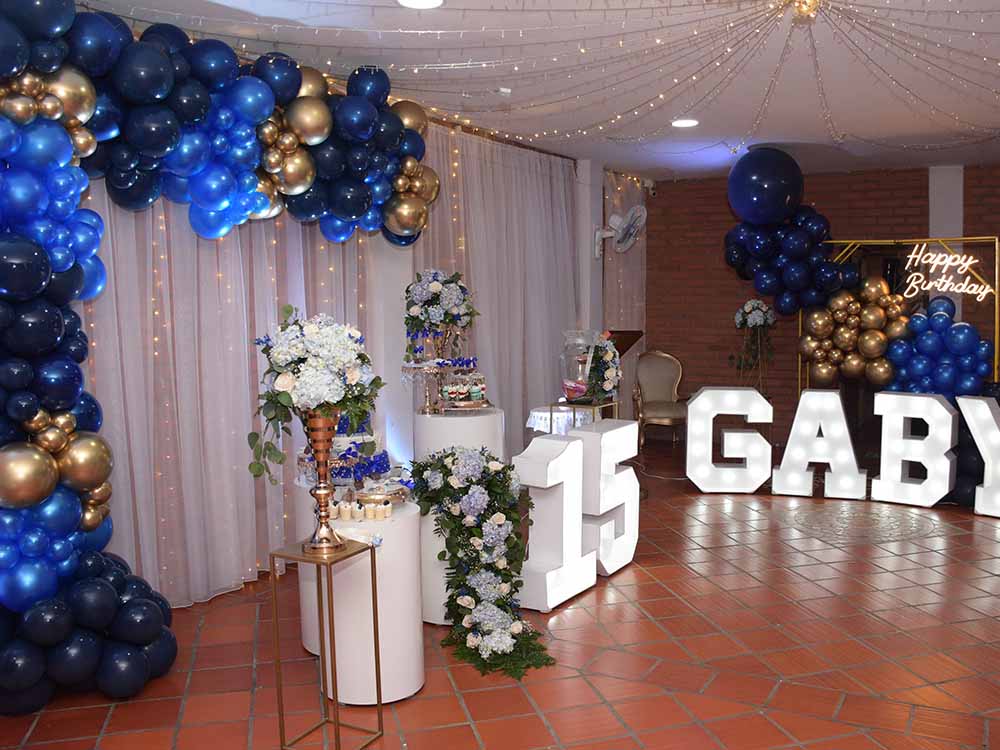 Quinceañera party 15th birthday decor ideas blue and gold theme.